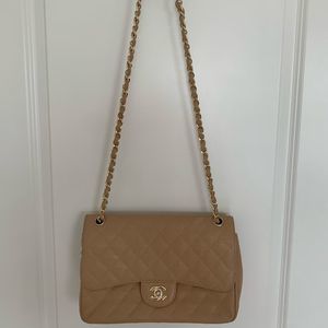 Medium double flap, beige, caviar leather bag with a CC lock